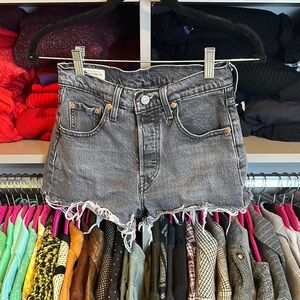 Levi’s black button fly raw hem denim shorts size 25